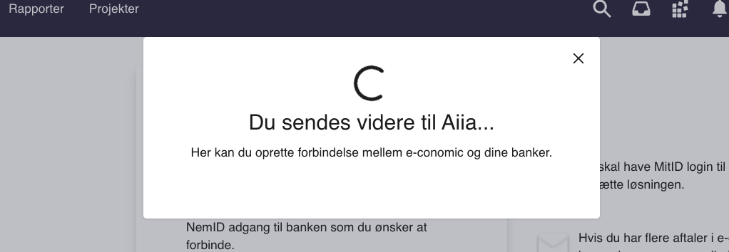 Viser pop-op-vinduet for viderestilling til Aiia i Bankintegration – bruges til at informere brugeren om at opsætningen fortsætter hos Aiia.